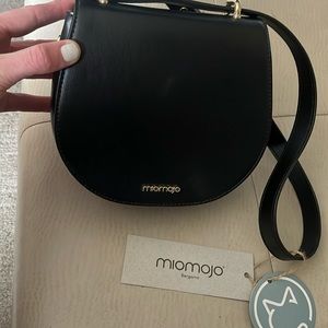 Designer vegan leather hang bag